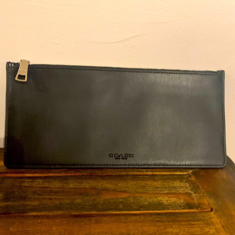 New without tags Coach clutch purse.